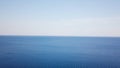 Aerial view Calm Sea and Blue Sky Background. Top view of the sea surface on a Sunny day Royalty Free Stock Photo