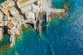 Aerial view of Camogli. Castle della Dragonara near the ligurian sea beach. View from above on rock and sea with transparent