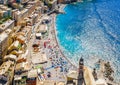 Aerial view of Camogli. Colorful buildings near the ligurian sea. View from above on the public beach with azure and clean water