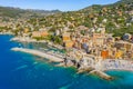 Aerial view of Camogli. Panorama of Castle della Dragonara and Basilica Santa Maria Assunta. Colorful buildings near the ligurian