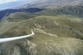 Aerial view of Canterbury landscape through perspex canopy from within glider cockpit in flight