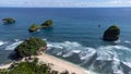 Aerial view of Goa Cina beach with white sand and big waves in Indonesia Royalty Free Stock Photo