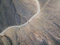 Aerial view of a car in the desert valleys of the island of Lanzarote, Canary Islands, Spain Royalty Free Stock Photo