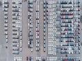 Aerial view car park at sea port or manufacture waiting for sale or export to worldwide Royalty Free Stock Photo