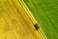 Aerial View Of Car SUV Parked Near Countryside Road In Spring Field Rural Landscape. Car Between Young Wheat And Corn Royalty Free Stock Photo