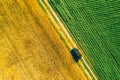 Aerial View Of Car SUV Parked Near Countryside Road In Spring Field Rural Landscape. Car Between Young Wheat And Corn Royalty Free Stock Photo