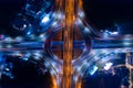 Aerial view of car traffic transportation above circle roundabout road in Asian city.