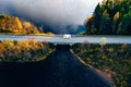 Aerial view Caravan trailer or Camper rv on the bridge over the lake in Finland Royalty Free Stock Photo