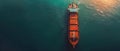 Aerial view of a cargo ship at a deep water port part of a shipping dock for global exports. Royalty Free Stock Photo