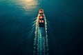 Aerial view of a cargo ship at sea with containers loaded on board Royalty Free Stock Photo