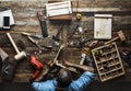 Aerial view of carpenter man working with tools equipment set