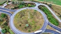 Aerial view of cars driving in a circle in city traffic. High quality 4k footage