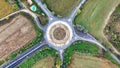 Aerial view of cars driving in a circle in city traffic. High quality 4k footage