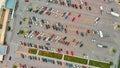 Aerial view of cars at large outdoor parking lots, USA. Outlet mall parking congestion and crowded parking lot, other cars try Royalty Free Stock Photo