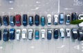 Aerial view on the cars on park place. View from drone on the carpark.