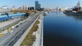 Aerial view of cars on the road near the Moscow river near the city center in summer day against blue sky. Scene. Urban Royalty Free Stock Photo