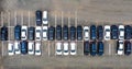 Aerial view cars for sale stock lot row, Car Dealer Inventory, parking lot. black and white new cars are in row Royalty Free Stock Photo