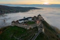 Aerial view about castle of Sumeg with foggy sunrise at the background. Royalty Free Stock Photo