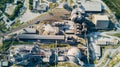 Aerial view of cement manufacturing plant. Concept of buildings at the factory, steel pipes, giants. Royalty Free Stock Photo