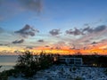An aerial view of Cemetery Beach on Seven Mile Beach in Grand Cayman Island with a beautiful sunset Royalty Free Stock Photo