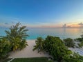 An aerial view of Cemetery Beach on Seven Mile Beach in Grand Cayman Island with a beautiful sunset Royalty Free Stock Photo