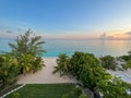 An aerial view of Cemetery Beach on Seven Mile Beach in Grand Cayman Island with a beautiful sunset Royalty Free Stock Photo