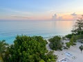 An aerial view of Cemetery Beach on Seven Mile Beach in Grand Cayman Island with a beautiful sunset Royalty Free Stock Photo