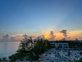 An aerial view of Cemetery Beach on Seven Mile Beach in Grand Cayman Island with a beautiful sunset Royalty Free Stock Photo