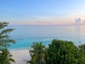 An aerial view of Cemetery Beach on Seven Mile Beach in Grand Cayman Island with a beautiful sunset Royalty Free Stock Photo