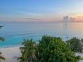 An aerial view of Cemetery Beach on Seven Mile Beach in Grand Cayman Island with a beautiful sunset Royalty Free Stock Photo