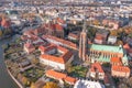 Aerial view of the center of an old European city, beautiful red roofs, old houses and a church. Wroclaw, Poland Royalty Free Stock Photo