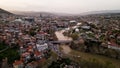 Aerial view of center of Tbilisi, bridge of peace over river Kura