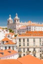 Lisbon city with red tile roofs and monastery Igreja Sao Vicente de Fora, Portugal Royalty Free Stock Photo