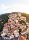 Aerial view Cervo medieval town on the mediterranean coast, Liguria riviera, Italy, with the beautiful baroque church and tower be