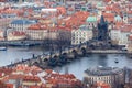 Aerial view of Charles Bridge over Vltava river and cityscape of Prague, Czech Republic