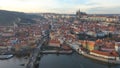 Aerial view of Charles Bridge and Prague Castle at sunset light in desember in Prague, Czech Republic Royalty Free Stock Photo