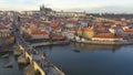 Aerial view of Charles Bridge and Prague Castle at sunset light in desember in Prague, Czech Republic Royalty Free Stock Photo