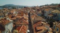 Aerial view of charming historic town with ancient buildings and vibrant red rooftops Royalty Free Stock Photo