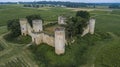 Aerial view Chateau de Budos and wheat field in summer