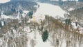 Aerial view of chateau Konopiste in the winter time, castle and the pond are covered with snow, Czech republic Royalty Free Stock Photo