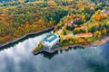 Aerial view chateau Orlik, above Orlik reservoir in beautiful autumn nature. Romantic royal Schwarzenberg castle above water level