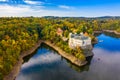 Aerial view chateau Orlik, above Orlik reservoir in beautiful autumn nature. Romantic royal Schwarzenberg castle above water level