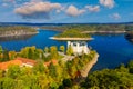 Aerial view chateau Orlik, above Orlik reservoir in beautiful autumn nature. Romantic royal Schwarzenberg castle above water level