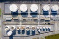 Aerial view of Chemical industry storage tank and tanker truck In wailting in Industrial Plant to tranfer oil to gas station Royalty Free Stock Photo