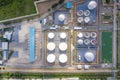 Aerial view of Chemical industry storage tank and tanker truck In wailting in Industrial Plant to tranfer oil to gas station Royalty Free Stock Photo