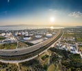 Aerial view of Chemical plant at sunset, oil refining, smoke, pipes, ecology pollution, air infection, coast of sea in