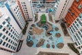 Aerial view children playground and house building exterior mixed-use urban residential district area development Royalty Free Stock Photo