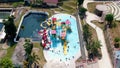 Aerial view of children playing on water slide in Kalibening, Java, Indonesia