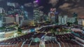 Aerial view of Chinatown with red roofs and Central Business District skyscrapers night timelapse, Singapore Royalty Free Stock Photo