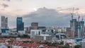 Aerial view of Chinatown with red roofs and Central Business District skyscrapers timelapse, Singapore Royalty Free Stock Photo